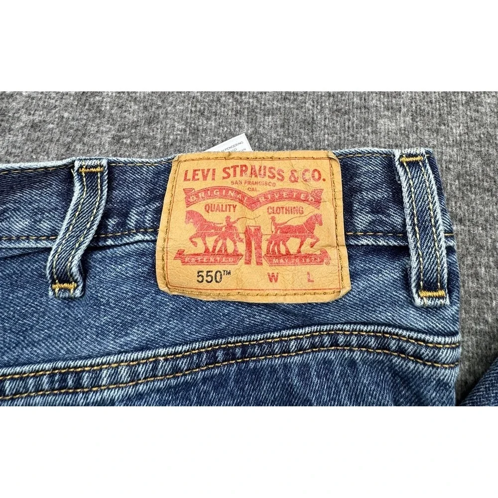 Levis 550 Relaxed Fit Mens Blue Jeans‎ Mens Size 50x32 Fits 50x31 Denim *Hole*